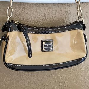 Dooney & Bourke 9x12 small over the shoulder, clutch style handbag.